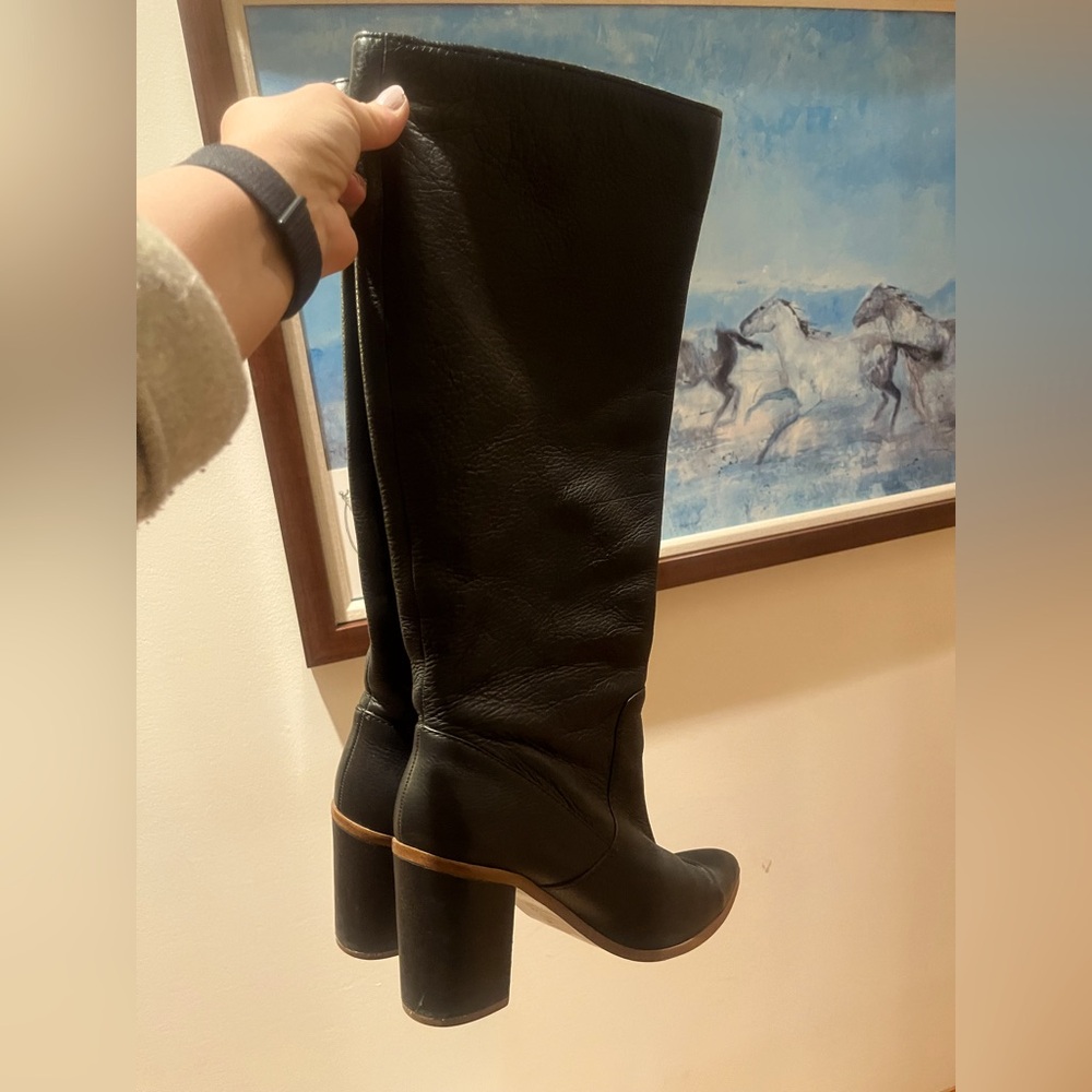 1. State tall leather black boots like new